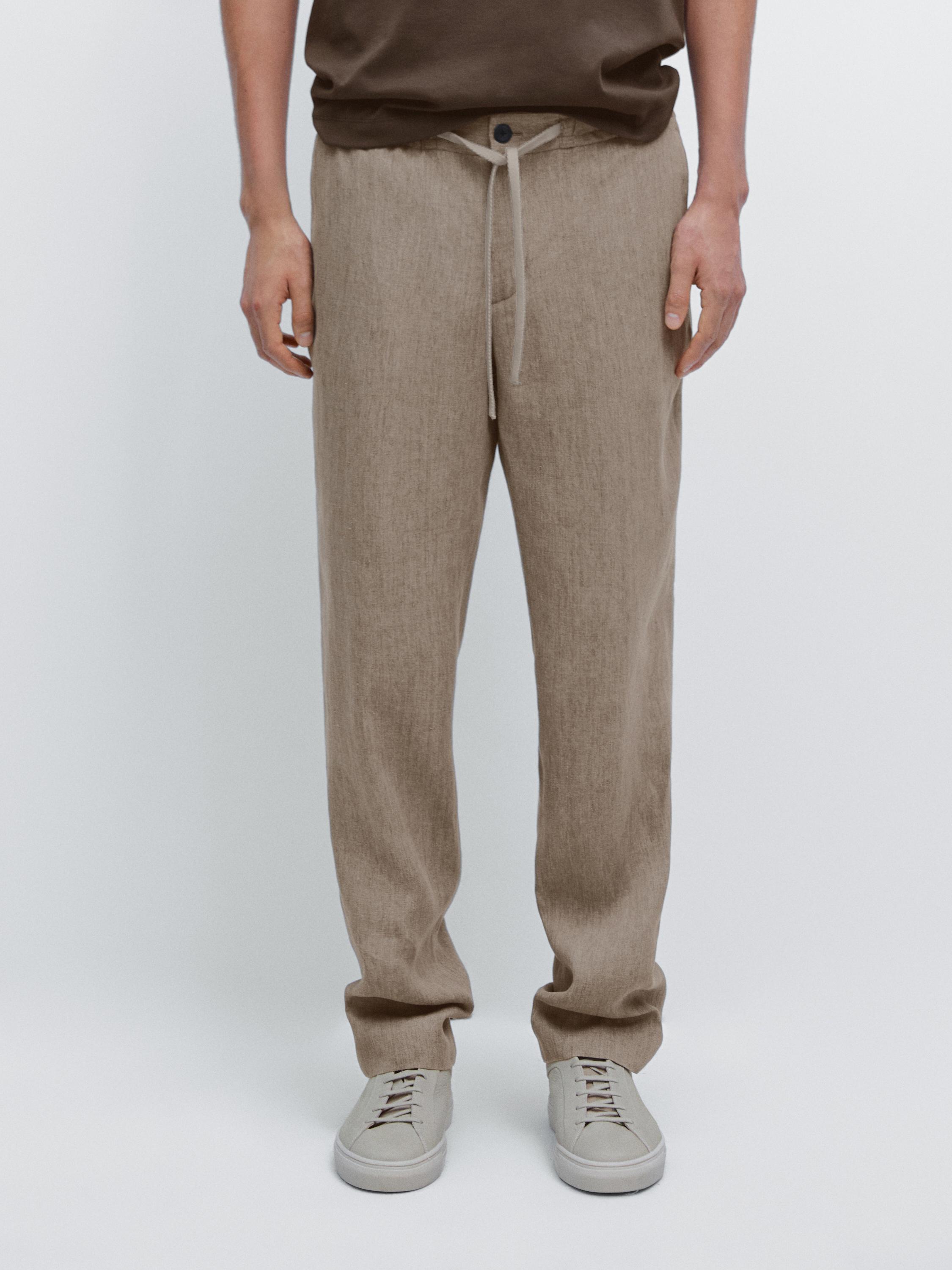 Faded total look linen trousers